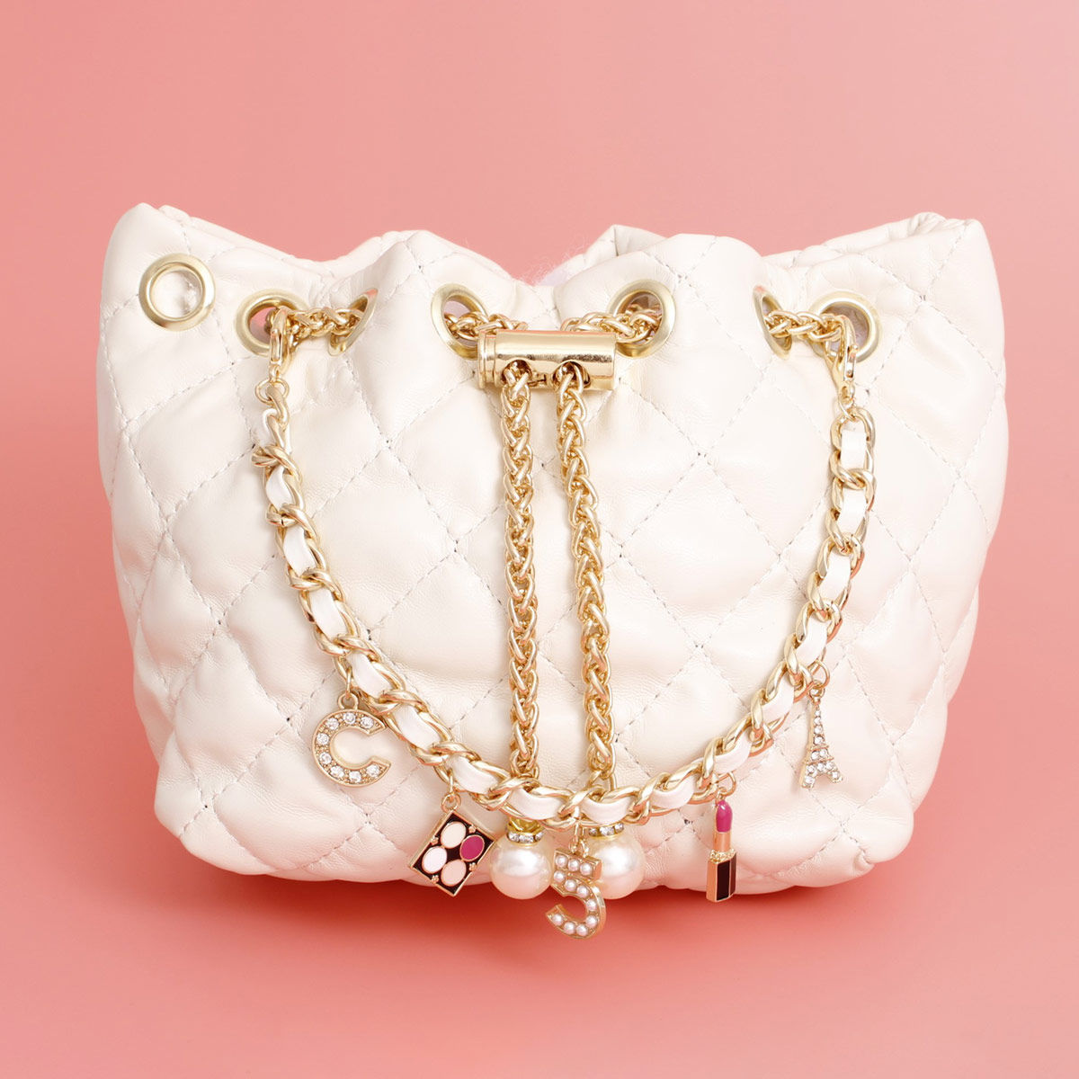 Mini Bucket White Quilted Parisian Lux Charm Bag - Premium Wholesale Fashion Accessories from Pinktown - Just $27! Shop now at chiquestyles